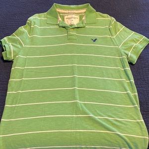 Mens Green with white stripe polo shirt.